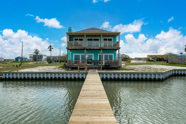 dock area with a water view