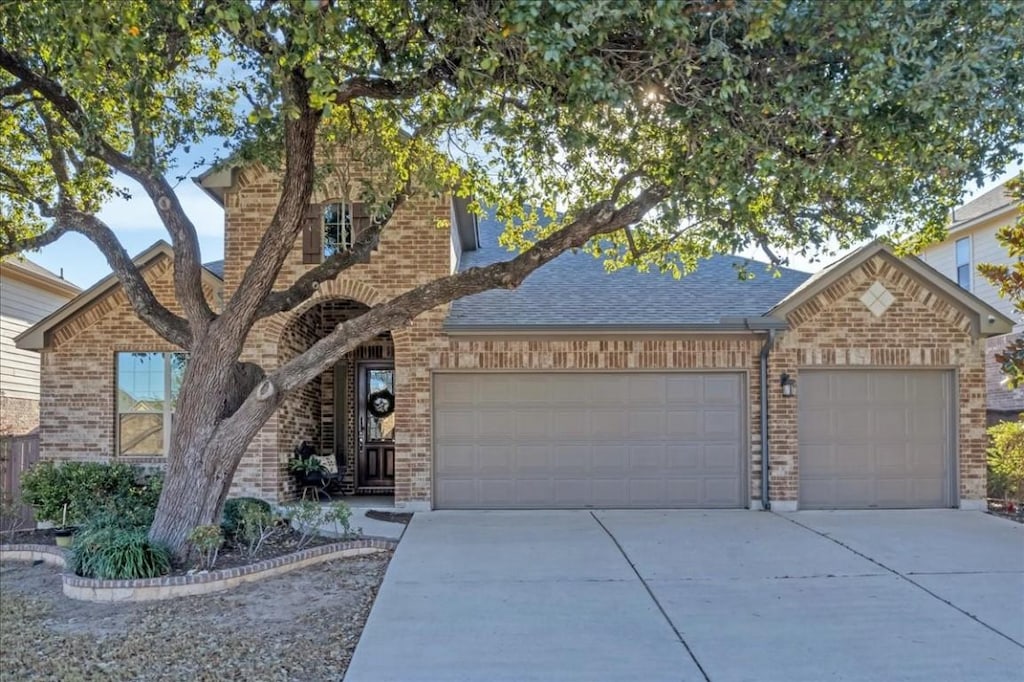 view of front of property with a garage