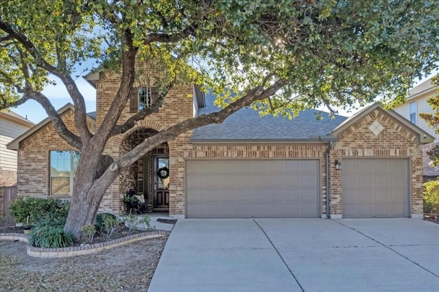 view of front of property with a garage