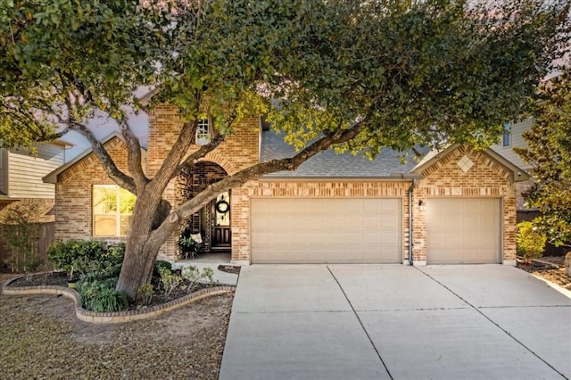 view of front of property featuring a garage