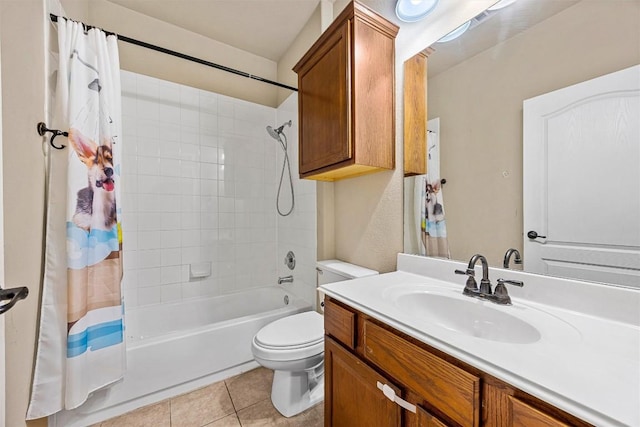 full bathroom featuring tile patterned floors, vanity, shower / bath combination with curtain, and toilet