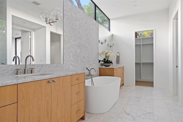 bathroom featuring a bathtub and vanity