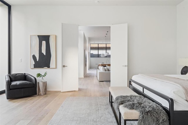 bedroom featuring light wood-type flooring