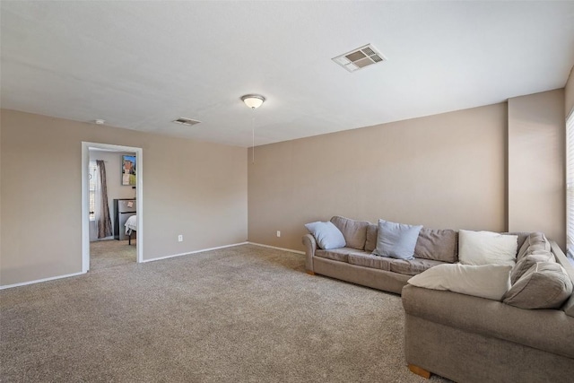 living room featuring light colored carpet