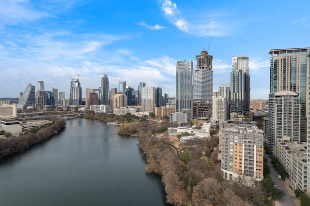 property's view of city featuring a water view