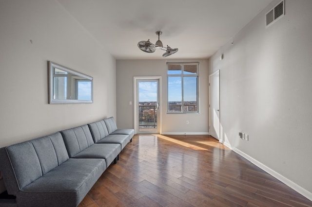 living room featuring dark hardwood / wood-style flooring