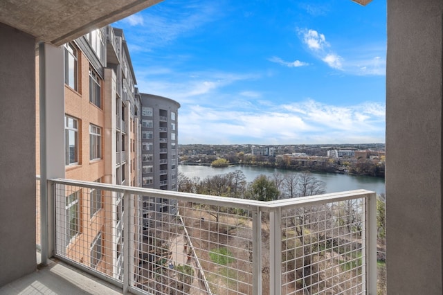 balcony featuring a water view