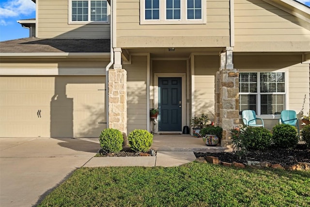 entrance to property featuring a garage