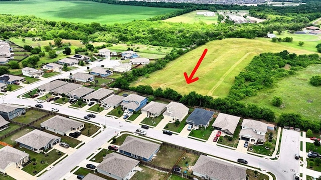 aerial view of property's location featuring nearby suburban area