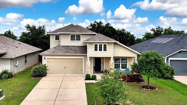 traditional-style home with concrete driveway, a front lawn, a garage, and roof with shingles