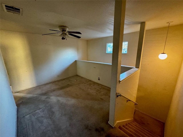 basement featuring ceiling fan