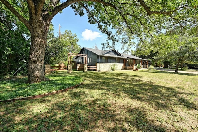 view of home's exterior with a yard