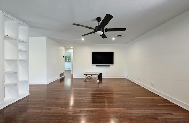 unfurnished living room with visible vents, baseboards, ceiling fan, and dark wood-style flooring