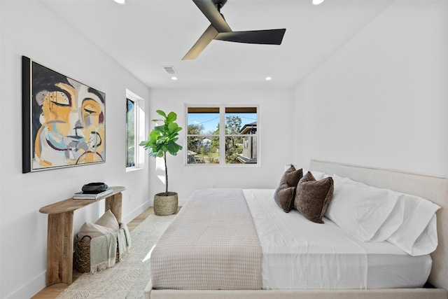 1407 Valleyridge Dr Unit A, Austin, TX 78704 - bedroom featuring visible vents, baseboards, wood finished floors, recessed lighting, and a ceiling fan