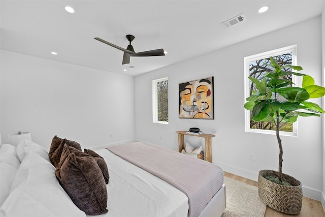 bedroom featuring ceiling fan and light hardwood / wood-style floors