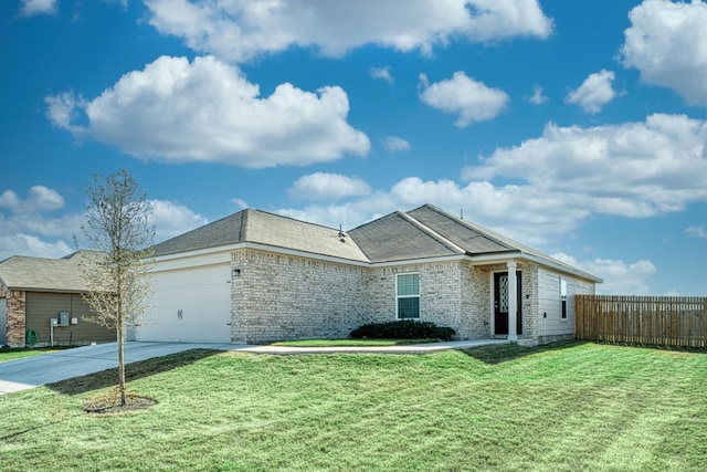 single story home featuring a garage and a front lawn