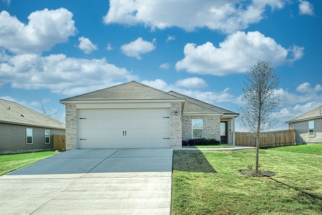 ranch-style house featuring a garage and a front yard