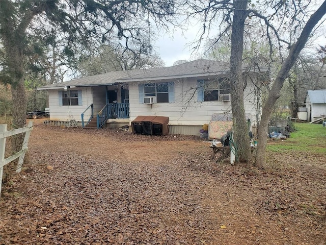 back of property with cooling unit