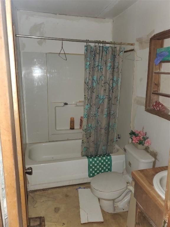 full bathroom with vanity, toilet, and shower / bathtub combination with curtain