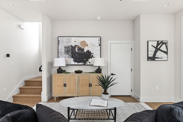 living room with wood-type flooring