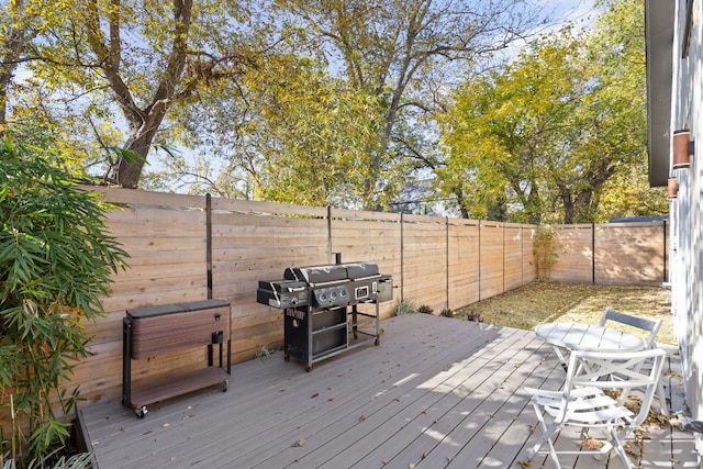 wooden deck featuring grilling area