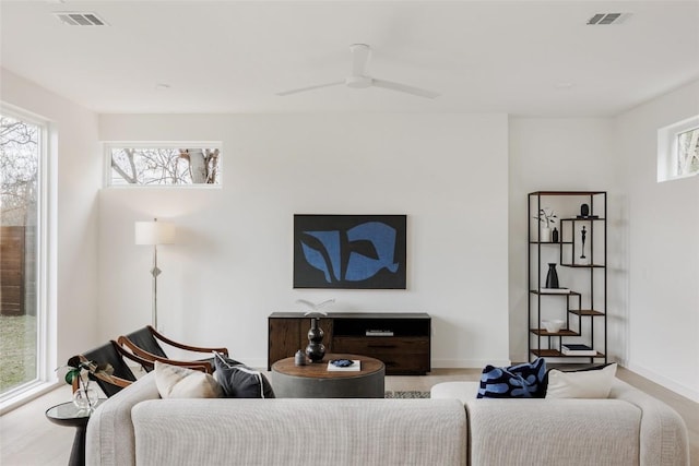 living room featuring ceiling fan