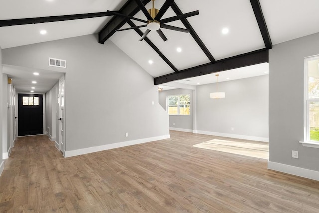 unfurnished living room with beam ceiling, high vaulted ceiling, light hardwood / wood-style flooring, and ceiling fan