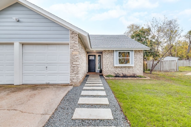 ranch-style home with driveway, a shingled roof, stone siding, fence, and a front lawn