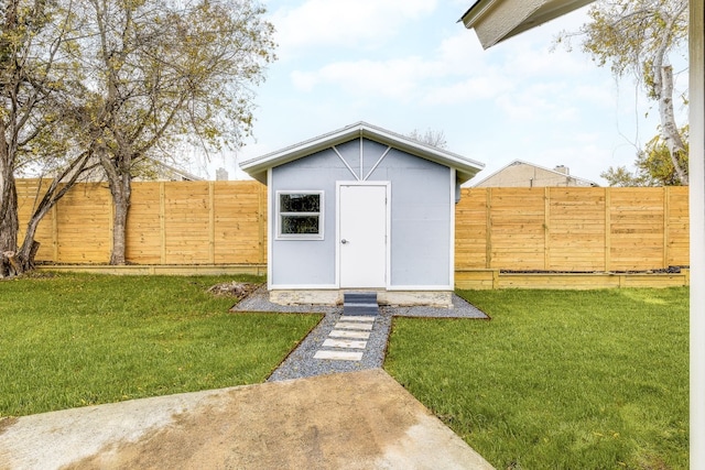 view of shed featuring a fenced backyard