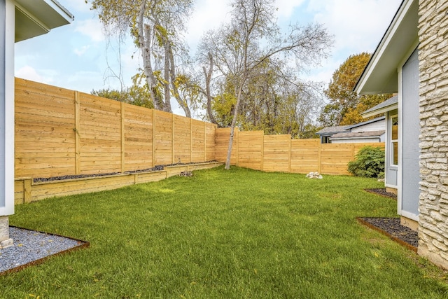 view of yard featuring a fenced backyard