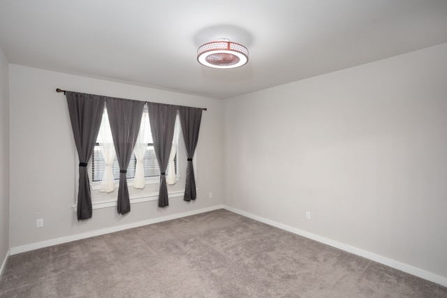 spare room with carpet floors