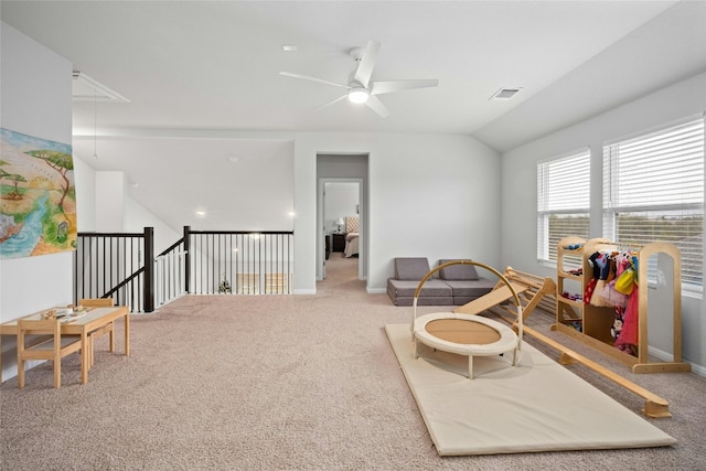 sitting room featuring carpet floors, ceiling fan, and lofted ceiling