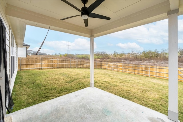 view of yard featuring ceiling fan and a patio area