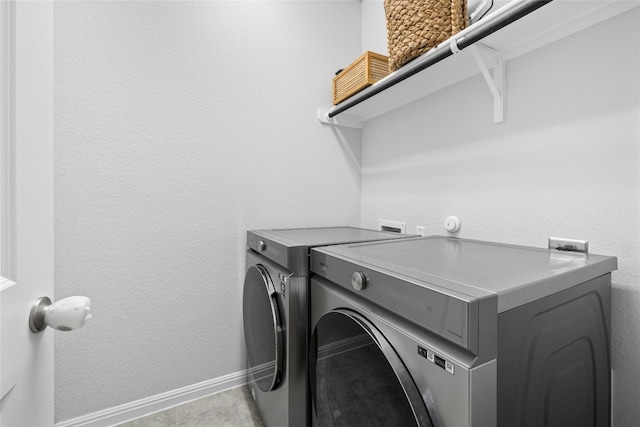 laundry room featuring washer and clothes dryer