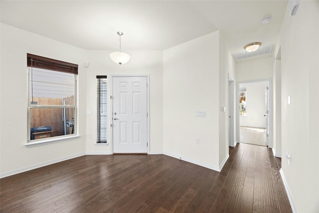 foyer featuring dark wood-type flooring