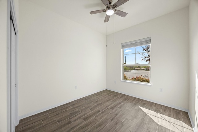 unfurnished room with ceiling fan and wood-type flooring