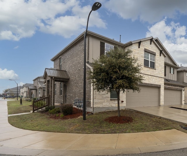 view of side of property with a garage