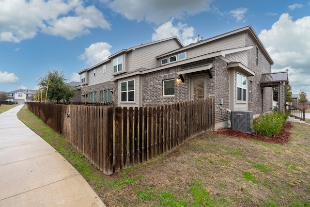 view of property exterior featuring cooling unit