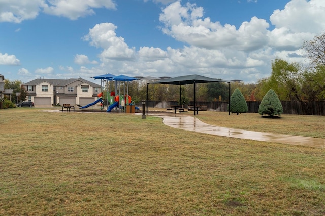 view of playground with a yard