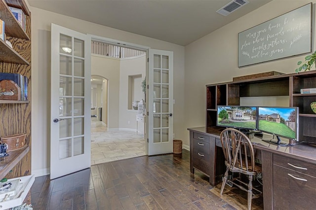 office space with dark hardwood / wood-style floors and french doors