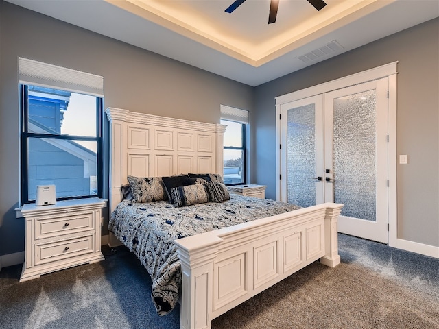 bedroom with french doors, access to outside, dark carpet, and ceiling fan