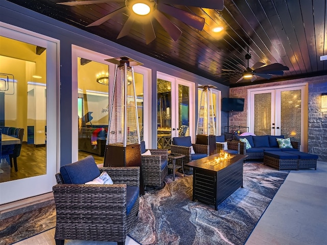 view of patio with outdoor lounge area, ceiling fan, and french doors