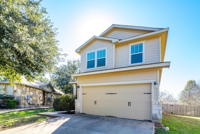 view of front of home with a garage