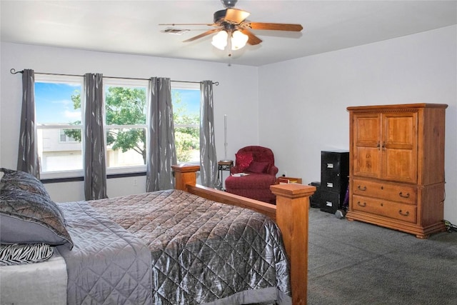 carpeted bedroom with ceiling fan