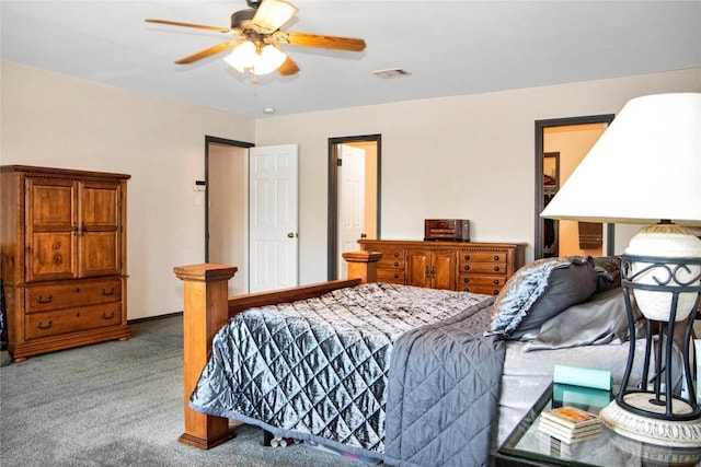 bedroom with ceiling fan and carpet floors