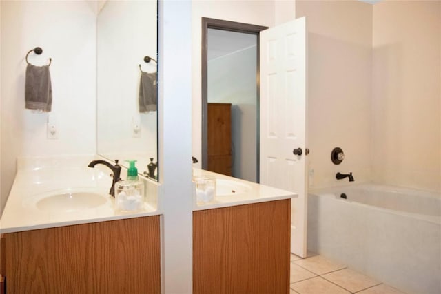 bathroom with tile patterned flooring and vanity