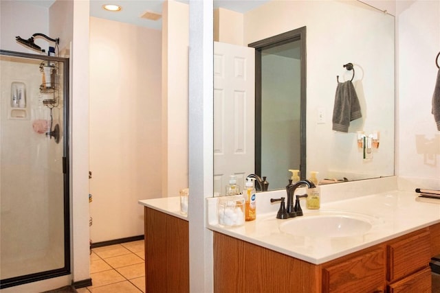 bathroom featuring tile patterned floors and vanity