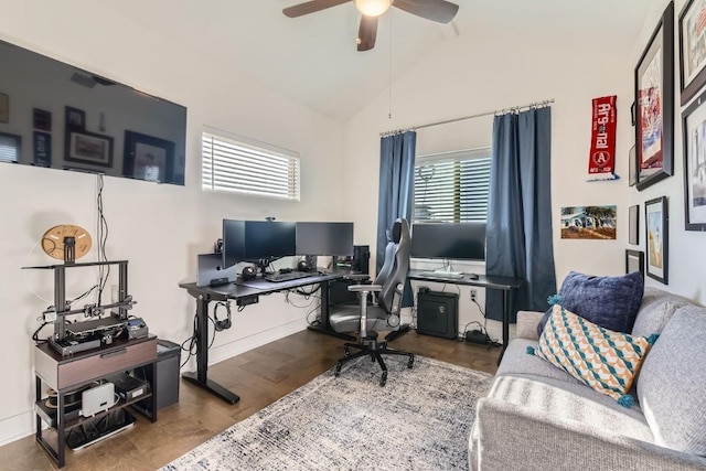 office area featuring hardwood / wood-style floors, vaulted ceiling, and ceiling fan