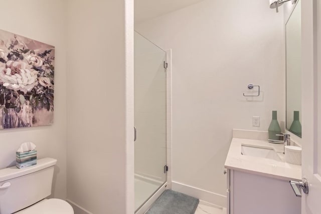 bathroom featuring an enclosed shower, vanity, and toilet