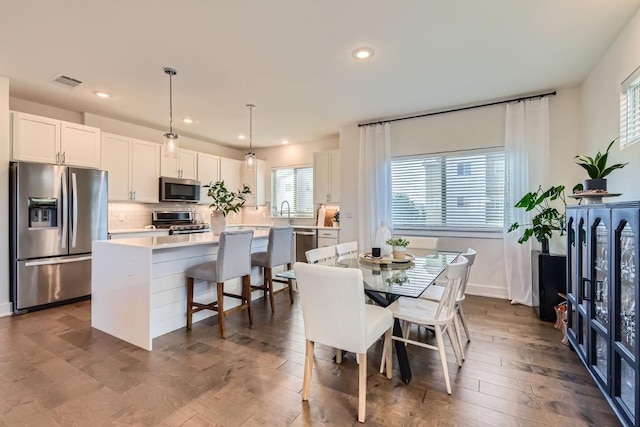 5315 La Crosse Ave Unit 24, Austin, TX 78739 - dining space featuring recessed lighting and dark wood-type flooring